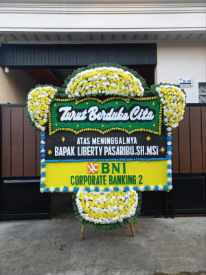 Papan Bunga Duka di Kayu Kapur