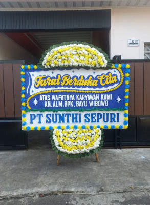 Papan Bunga Duka di Kayu Kapur