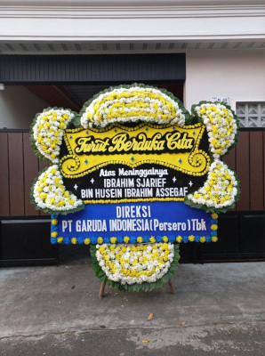 Papan Bunga Duka di Kayu Kapur