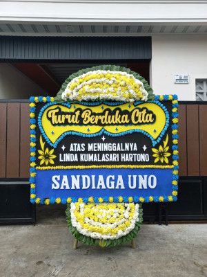 Papan Bunga Duka di Kayu Kapur